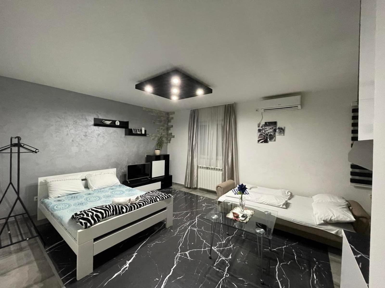 Airport Apartments Belgrado Quarto foto